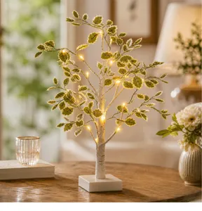 Lámpara decorativa LED de árbol con hojas luminosas cálidas para decoración interior del hogar.