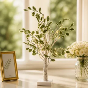 Lámpara de árbol de abedul LED con ramas luminosas blanco cálido para decoración de dormitorio.