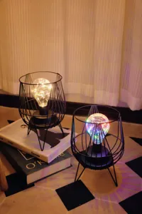 Creative iron art LED night light, modern minimalist decorative desk lamp for bedroom aesthetic.