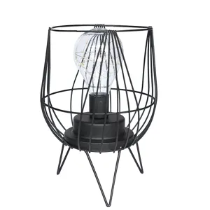 Modern black metal wire table lamp with LED fairy lights bulb for home decor and night lighting.