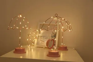 Rosa hierro arte paraguas forma LED alambre de cobre lámpara de mesa luz nocturna decorativa