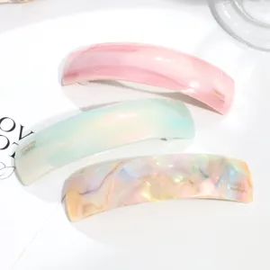 Mollette per capelli in acetato minimaliste, fermagli a molla curvi per eleganti acconciature.
