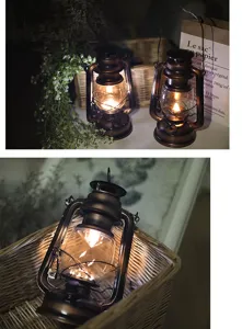 Vintage solar camping lantern, retro LED copper wire hanging light for outdoor decor.