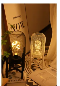 Cozy mesh lantern decorative lamp detail, warm bedside night light with soft glowing lights.