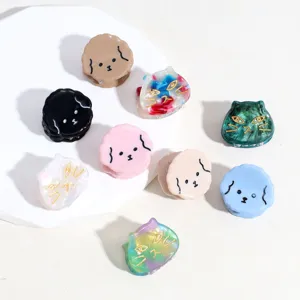 Detailed view of mini cute animal hair claws, assorted colors resin hair accessories for styling.