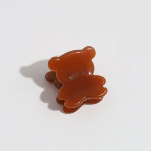 Cute mini bear hair claw clip, brown resin hair accessory for side bangs and broken hair.