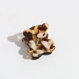 Cute mini bear hair claw clip with classic tortoiseshell pattern, perfect for side hair or bangs styling.