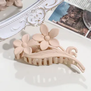 Matte frangipani hair claw clip large floral hairpin for women back head bun styling detail