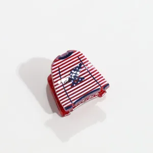 Pince à cheveux rouge blanche et bleue avec des paillettes style fête nationale.