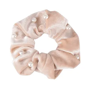 Velvet pearl hair scrunchie detail view, elegant solid color soft elastic hair tie for daily use.