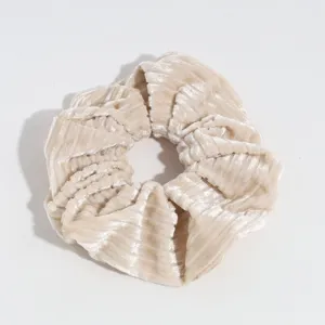 Beige corduroy hair scrunchie detail shot, soft velvet elastic hair band for daily ponytails.