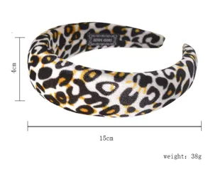 Detailed view of the leopard print padded headband, showing texture, 4cm width and 15cm size.