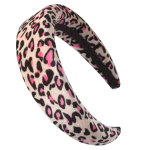 Close-up detail of the trendy leopard print velvet padded headband showing soft texture and edge.