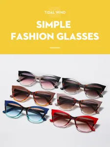 Detail view of fashionable Y2K cat-eye sunglasses with gradient lenses in multiple colors.