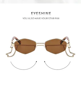 Detailansicht der polygonen Vintage-Sonnenbrille mit braunen Gläsern und Metallkette.