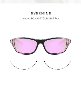 Vue détaillée de lunettes de soleil de sport cycliste avec verres roses et monture coupe-vent.