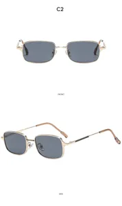 Detail view of retro square metal sunglasses featuring stylish grey lenses and gold frame.