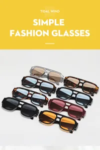 Vista detallada de gafas de sol de moda con doble puente en varios colores de tendencia.