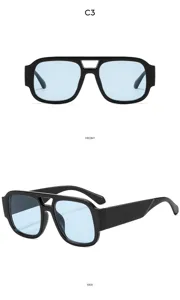 Gafas de sol vintage de doble puente con lentes azul claro y montura negra.
