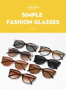 Chic retro cat-eye sunglasses with stylish gradient lenses for women, fashionable outdoor eyewear.