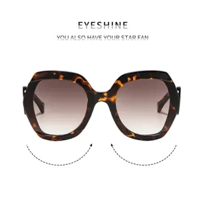 Femmes grandes lunettes de soleil écaille verres dégradés détail protection UV chic