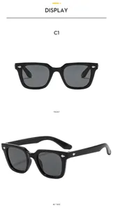 Detailansicht der schwarzen quadratischen Sonnenbrille mit Metallnieten für Kinder und Outdoor.