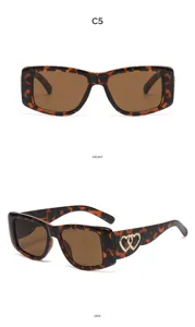 Retro tortoiseshell cat-eye sunglasses with chic side metal double heart charm details.