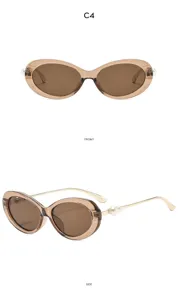 Detail view of retro oval sunglasses with brown frames and pearl embellished gold temples.