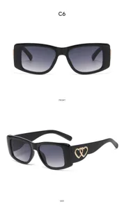 Black cat eye sunglasses with gold heart temples, detailed front and side view display.
