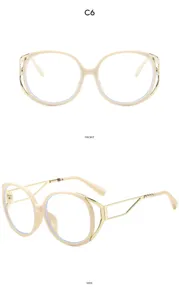 Elegante kattenoog blauwlichtfilter bril met stijlvolle gouden metalen veren voor dagelijks.