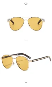 Occhiali da sole retro in metallo a doppio ponte con lenti gialle per guida all'aperto.