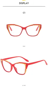 Vue détaillée des lunettes de vue cat-eye rouge et or, design géométrique moderne.