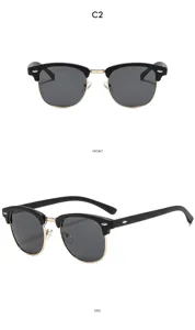 Klassische Browline Sonnenbrille mit schwarzem Gestell Goldsteg und grauen Gläsern.