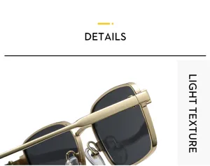 Close-up detail of stylish gold metal square frame sunglasses with dark lenses for outdoor wear.