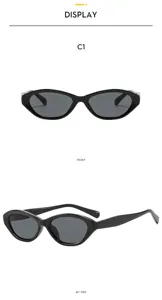 Lunettes de soleil cat eye noires, lunettes tendance avec protection UV pour les voyages en plein air.