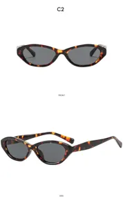 Lunettes de soleil cat-eye écailles tendance avec verres gris pour protection solaire chic.