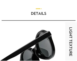 Detailed view of black vintage sunglasses temple and frame showing smooth lightweight texture.