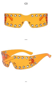 Y2K punk style orange oversized shield sunglasses with metal eyelet rivets for street fashion.