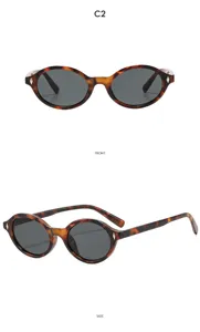 Vintage tortoise round sunglasses with metal rivets, UV protection fashion eyewear detail view.