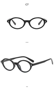 Detailed view of vintage round black optical glasses featuring delicate metal rivet accents.