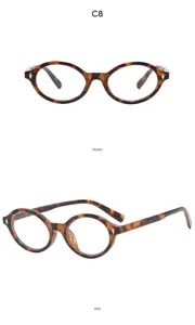 Detail view of vintage tortoise shell round glasses with chic metal rivet accents.