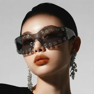 Punk grommet Y2K one-piece sunglasses for women, cool futuristic street style eyewear.