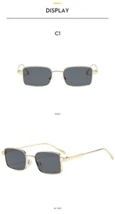 Detailed view of women's vintage square metal sunglasses with dark anti-UV lenses in gold frame.