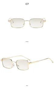 Metal vintage square sunglasses detail view, stylish gold frame with gradient lenses.