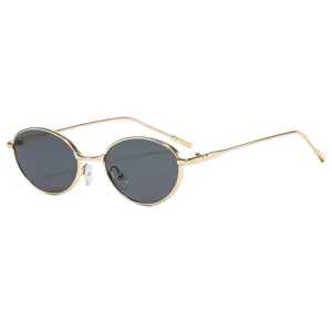 Occhiali da sole donna ovali montatura metallo oro vintage eleganti protezione UV solari.