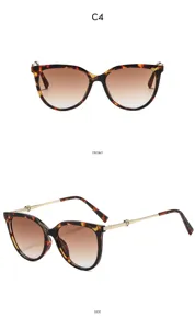 Retro cat eye sunglasses for women, oversized tortoise frame with gradient brown lenses.