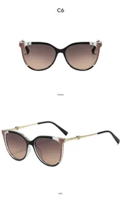 Oversized cat-eye sunglasses with gradient lenses and stylish heart metal temples for women outdoor.
