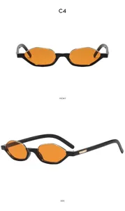 Gafas de sol poligonales de moda con lentes naranjas y montura negra para estilo urbano.