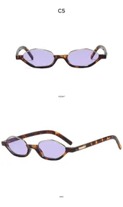 Vista detallada de gafas de sol poligonales estrechas con lentes moradas muy de moda.