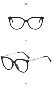 Classic cat-eye optical glasses with metal heart temples and black frame detail view.
